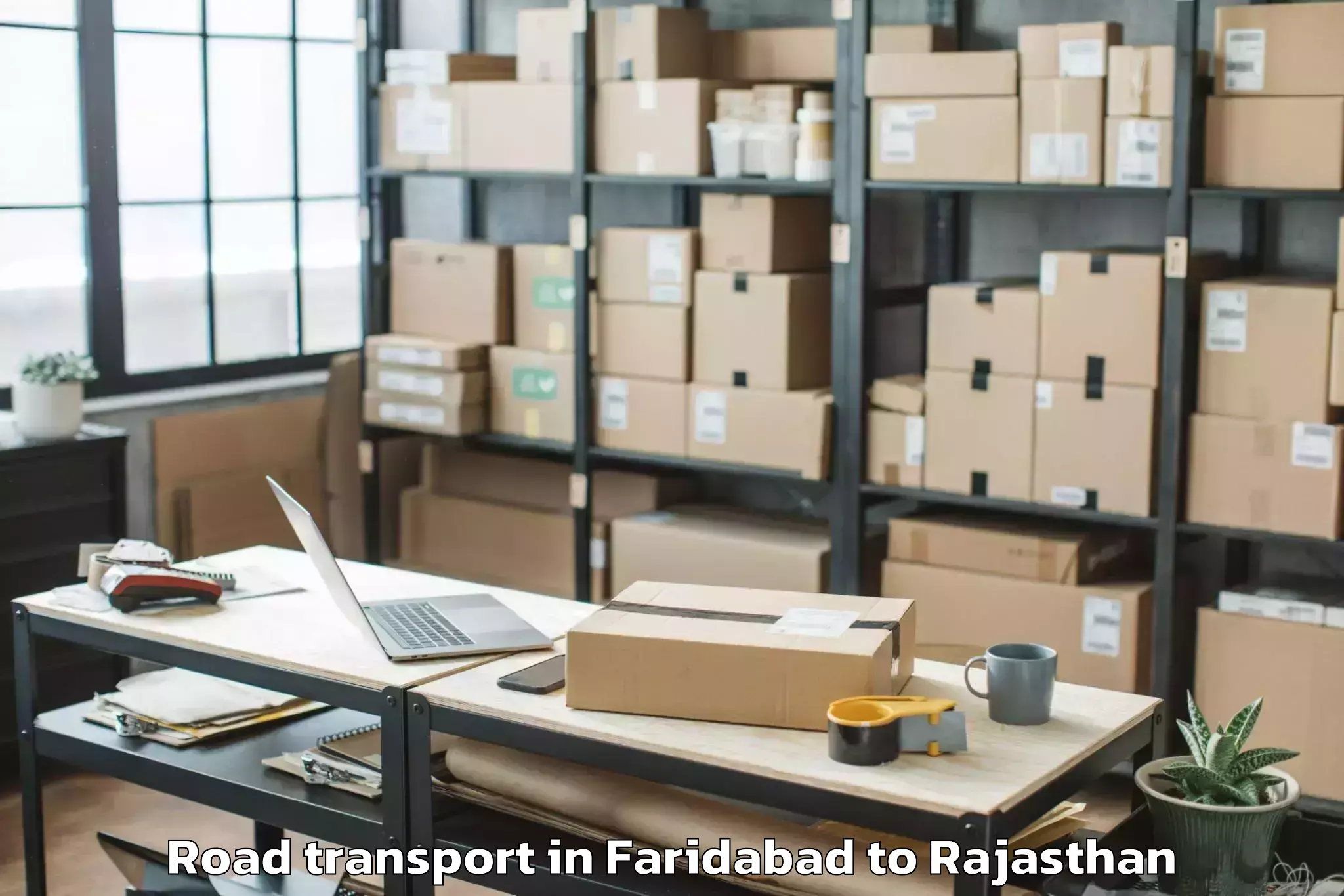 Top Faridabad to Hindoli Road Transport Available